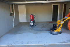 Diamond grinding and prep work on garage floor before epoxy coating