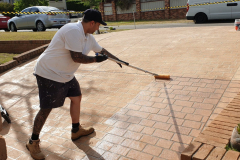 Recoating-non-slip-concrete-sealer-to-driveway-and-paving-at-McCartney-NSW-3