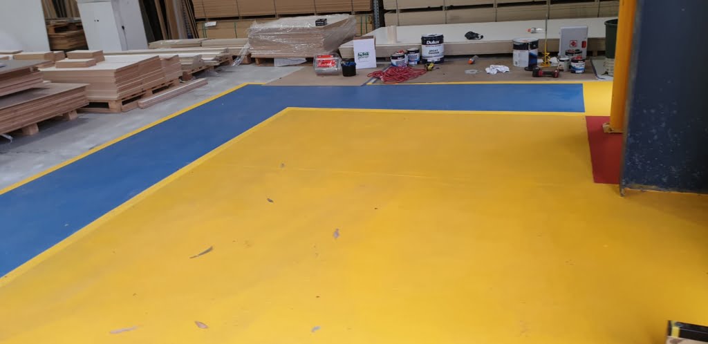 Epoxy coating and line marking to the workshop roller doors entries 2