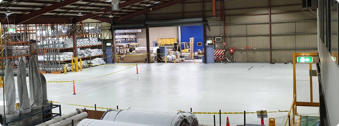 Light Gray Epoxy Coating on Commercial Warehouse Concrete Floor