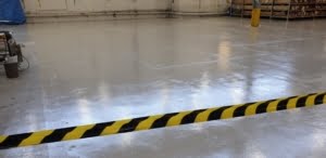 light gray epoxy coating in a warehouse floor 